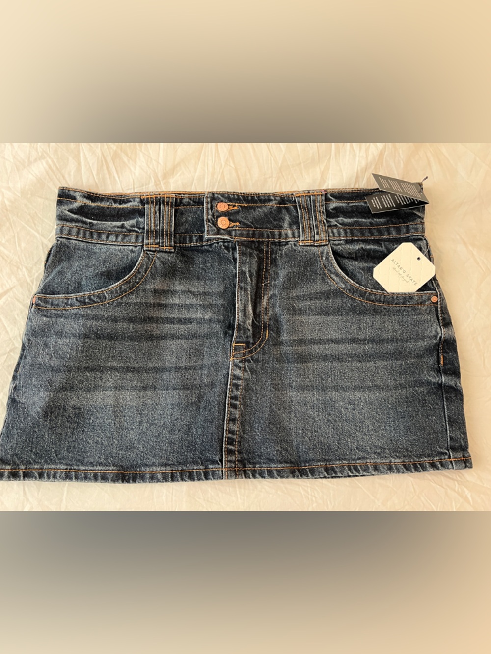 NWT $64 Altar'd State Mini Denim Skirt
Medium Wash